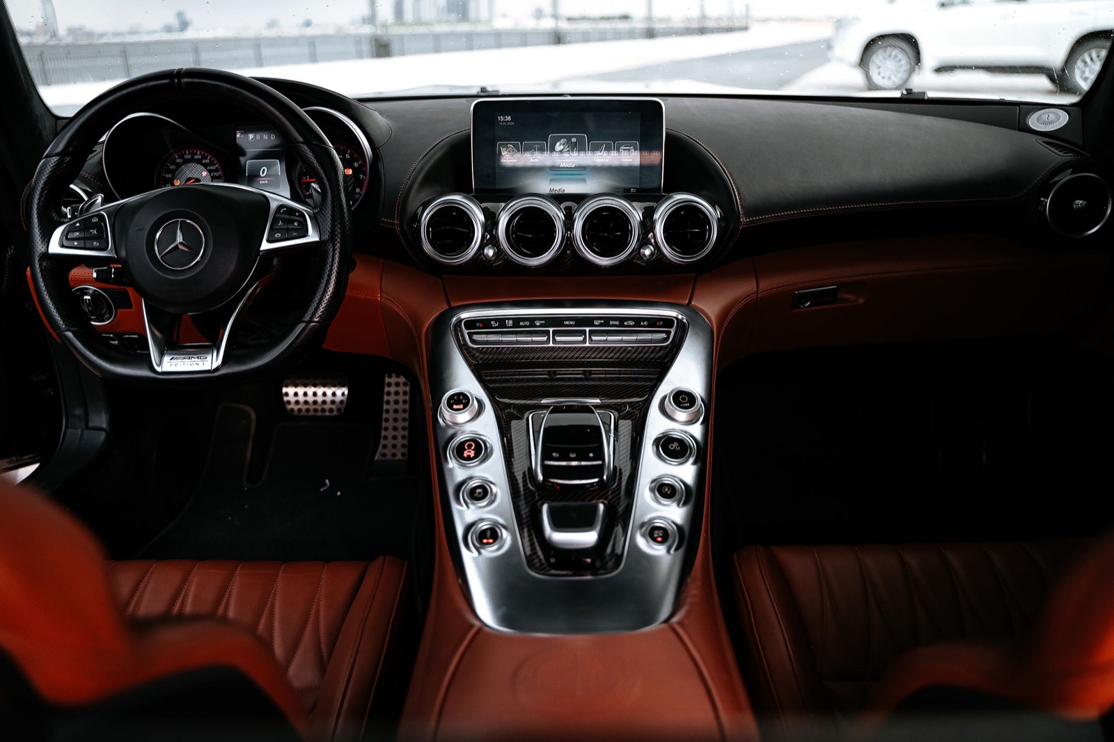 A clean car interior with dashboard and steering wheel